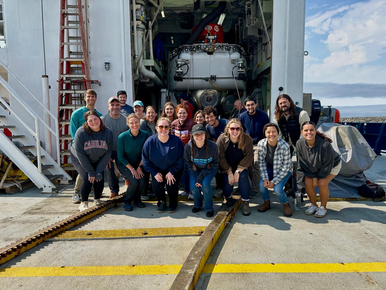 Science crew on R/V Atlantis deck in front of Alvin